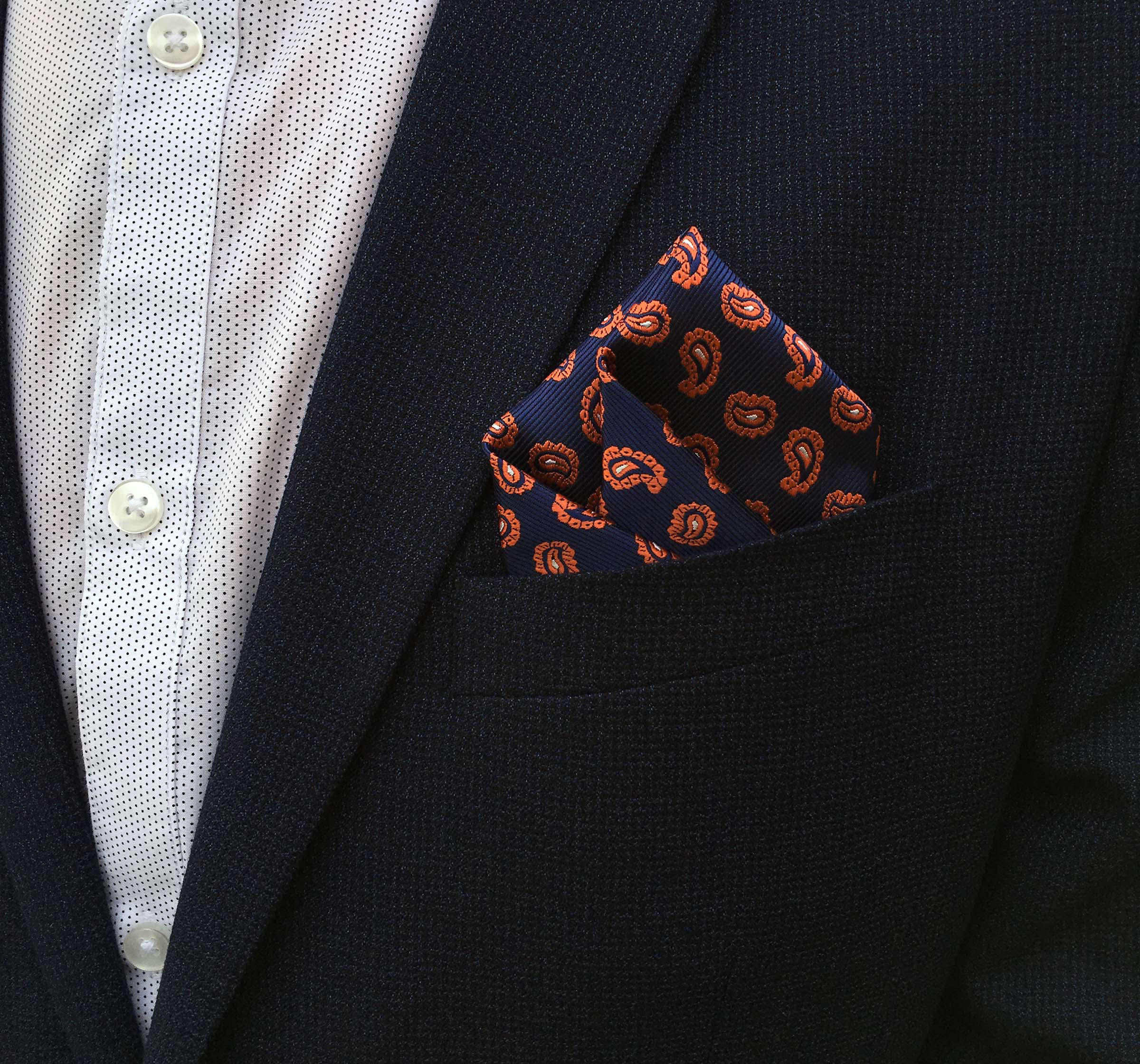Two gentlemen together with a pretty women showing their classy di Venisco pocket square.