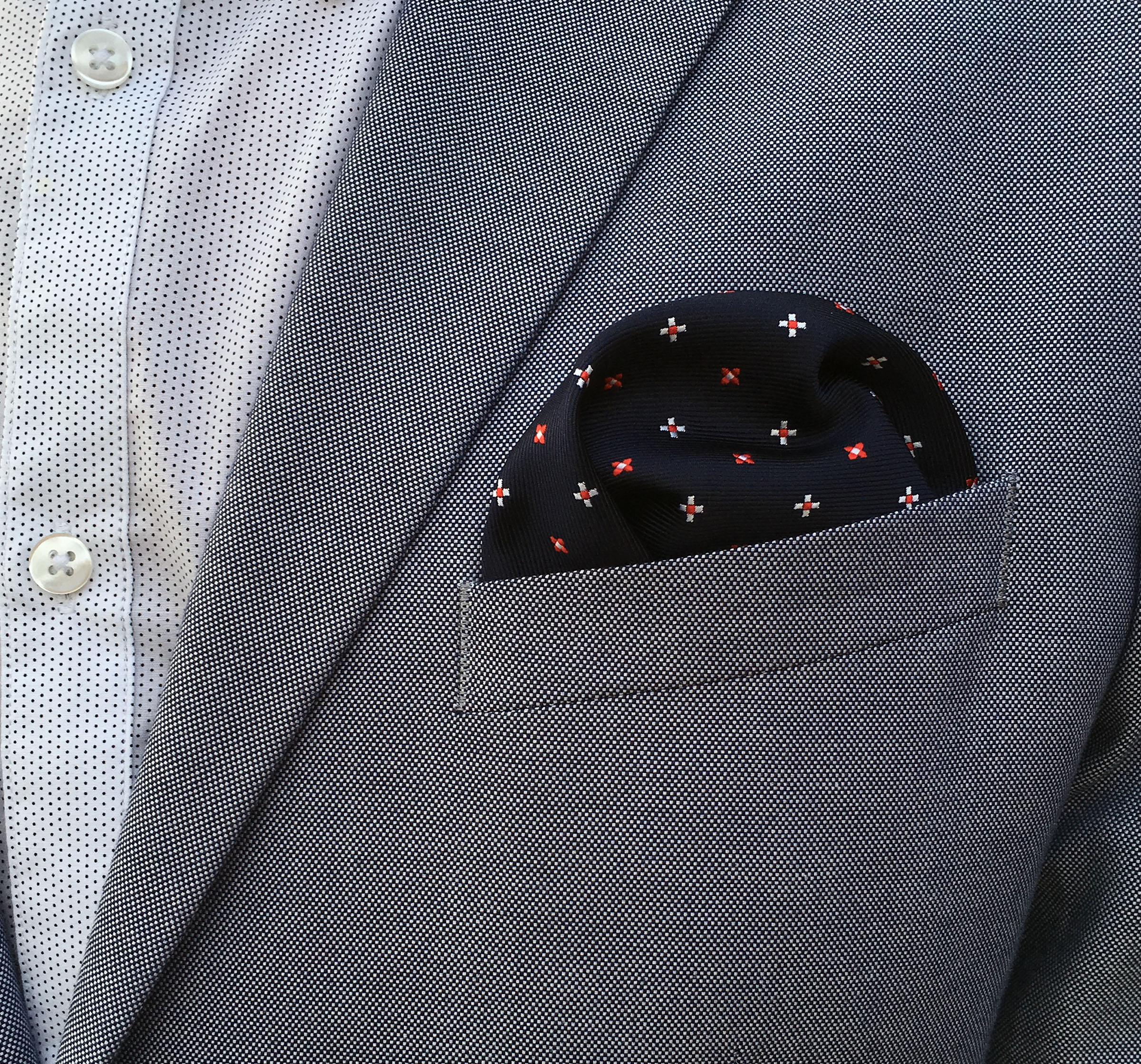 Two gentlemen together with a pretty women showing their classy di Venisco pocket square.